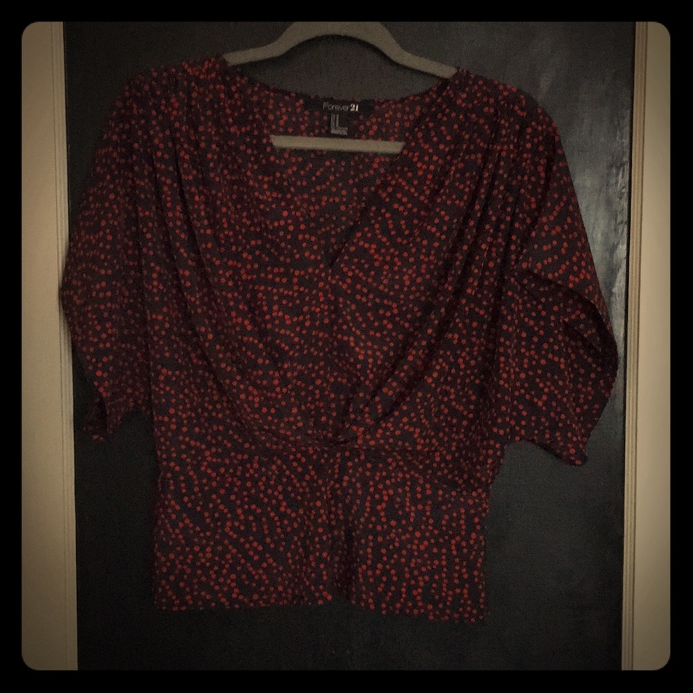 Navy blouse with red polka dots